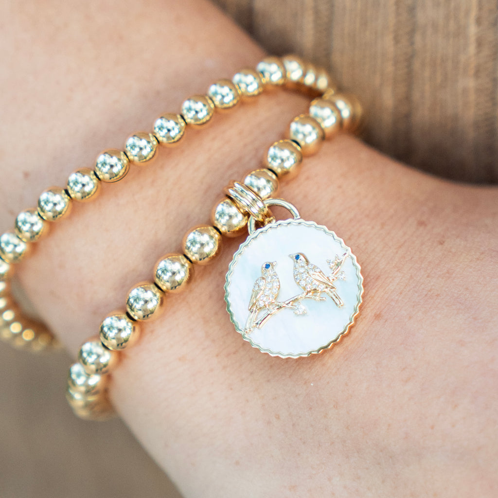 Birds of a Feather Mother of Pearl, Blue Sapphire and Diamond Charm Pendant