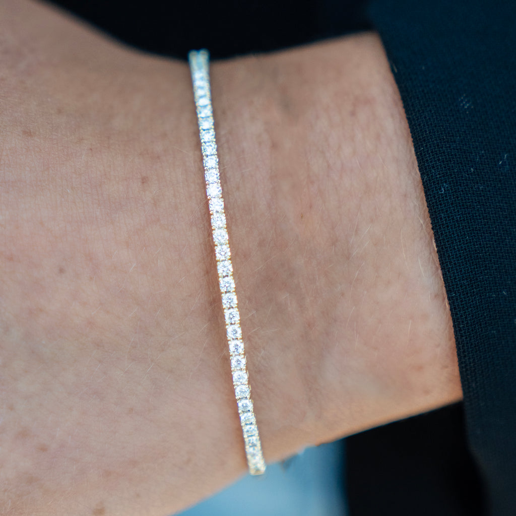 One carat Natural Diamond Flexible Tennis Bangle in  14k Yellow Gold