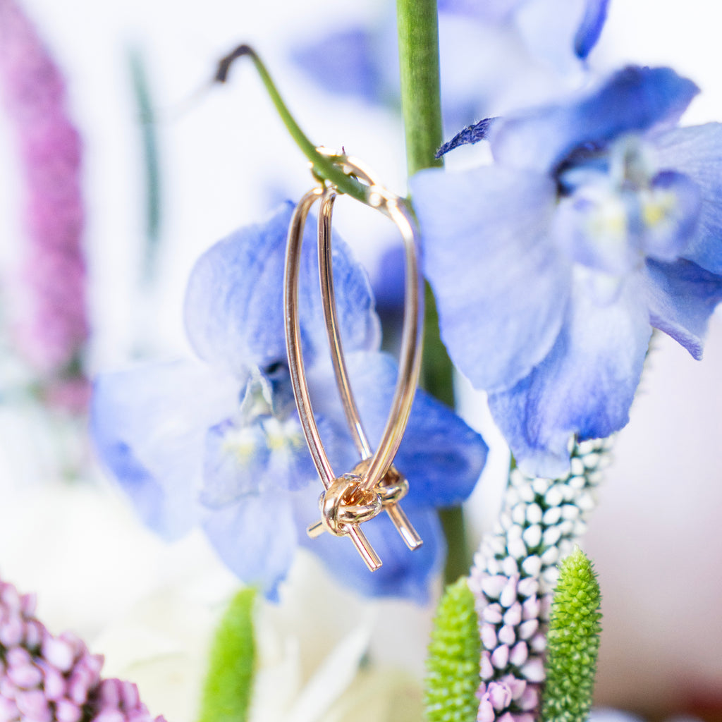 Large 14k Gold Oval Hoop with Love Knot