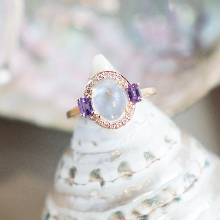 Oval Cabochon Rainbow Moonstone with Diamond Halo and Pink