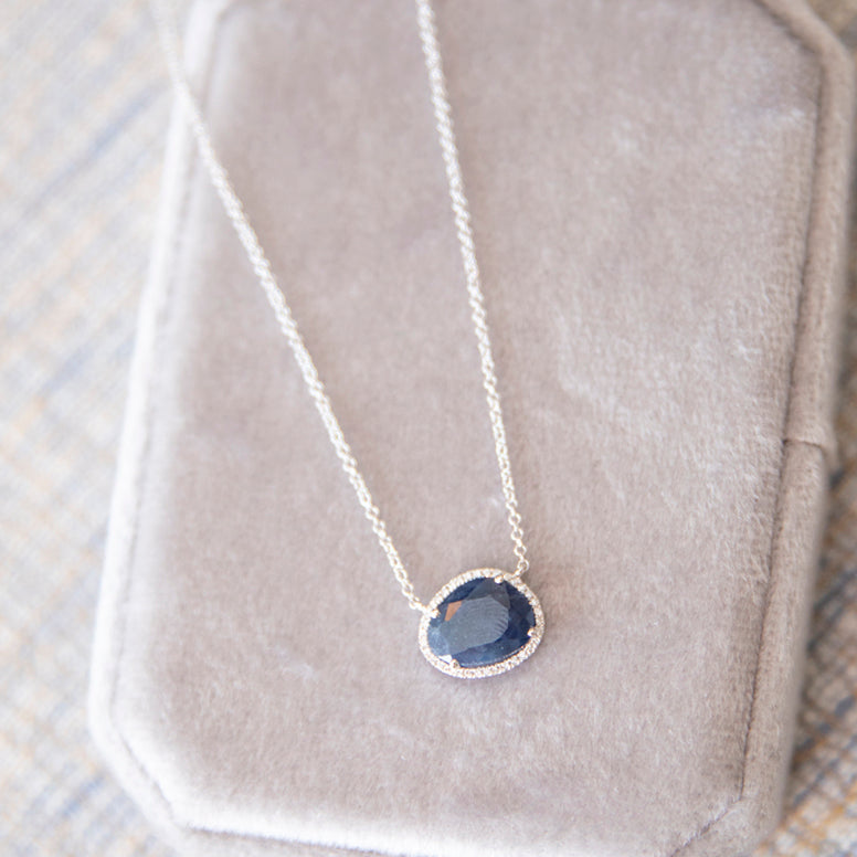 Organic shaped Blue Sapphire and Diamond Halo Necklace in 14k White Gold