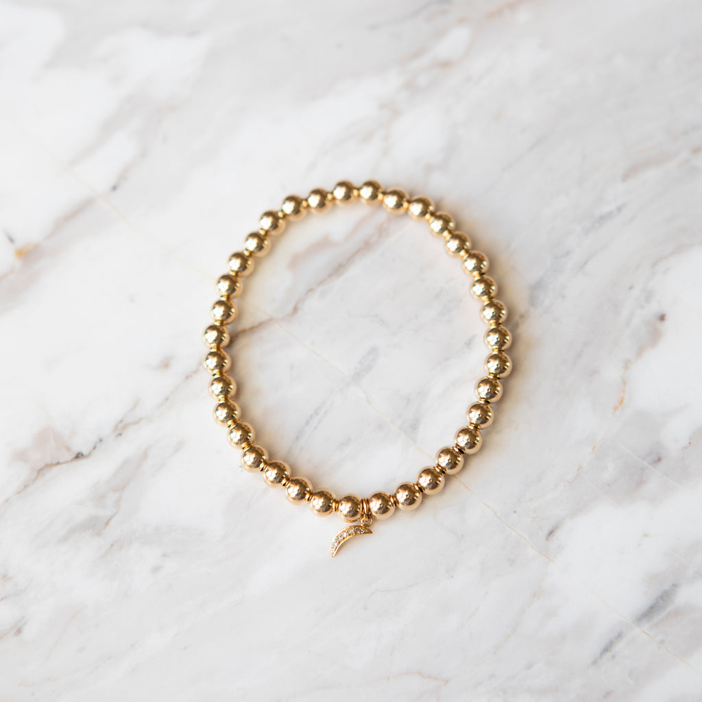 Gold Ball and Diamond Crescent Charm Bracelet