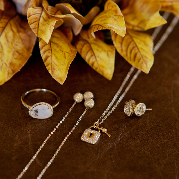 Organic shaped Moonstone Ring with Diamond Halo