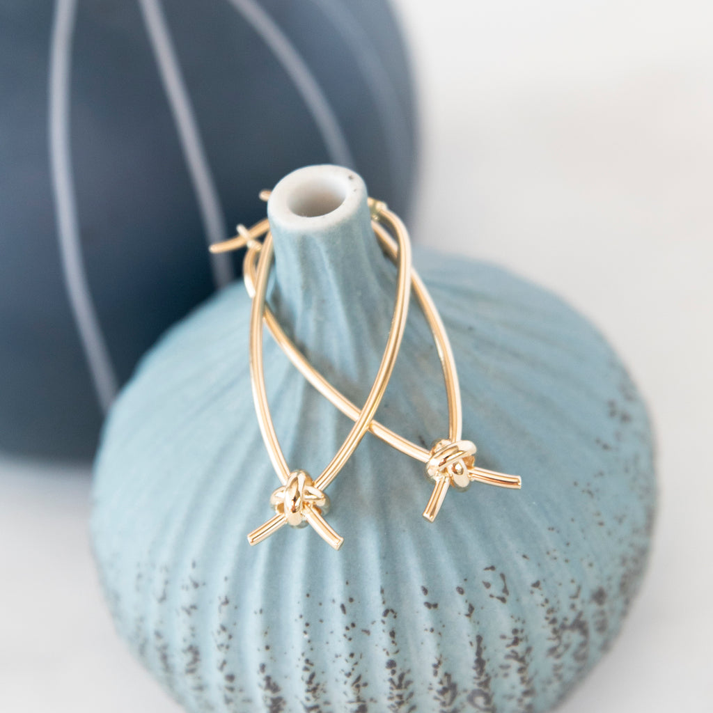 Large 14k Gold Oval Hoop with Love Knot