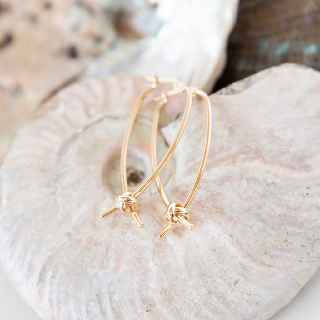 Large 14k Gold Oval Hoop with Love Knot