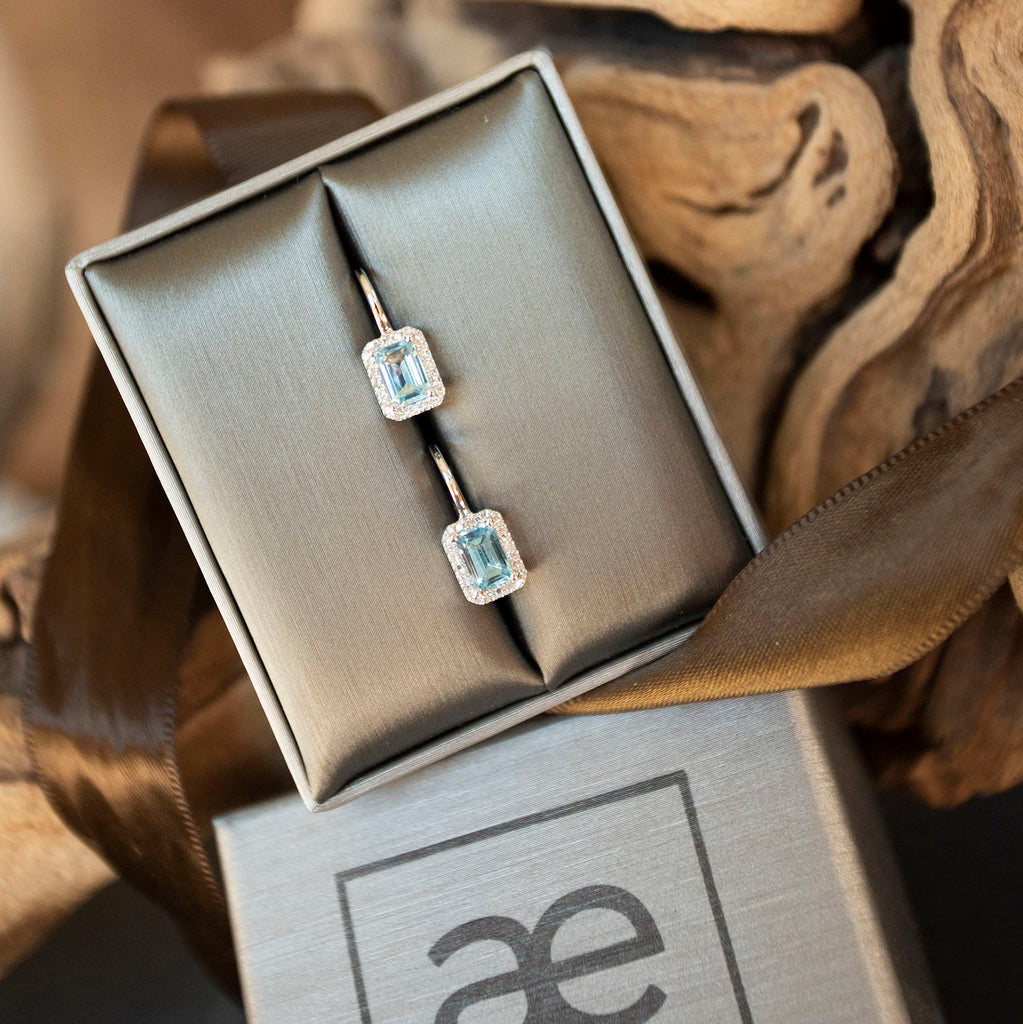Sky Blue Topaz and Diamond Halo Earrings
